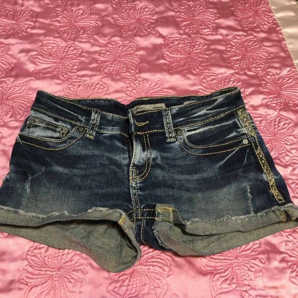 BUCKLE Sabrina distressed jean shorts SIZE 27